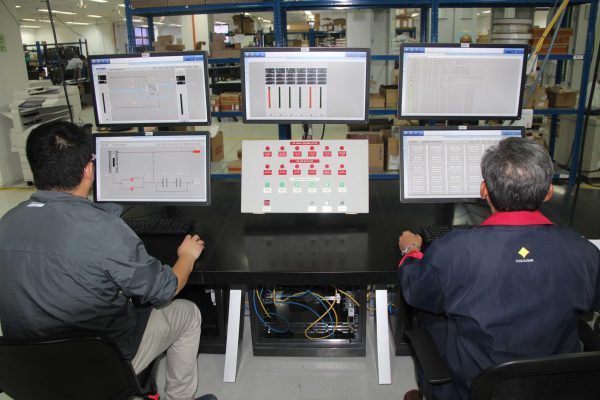 Operators at control-room screens during process operations training